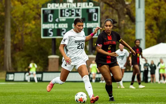 Shelby Vaughn brings a ball forward against Maryland