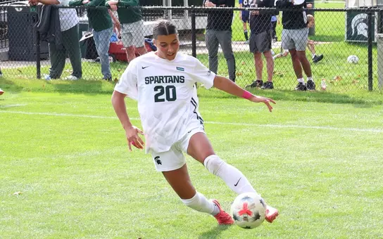 Shelby Vaughn looks for a shot on net against Maryland