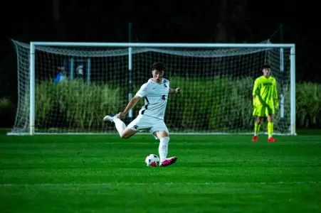 Conner O'Keefe strikes the ball.
