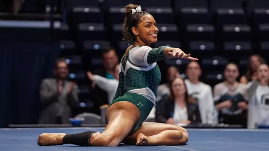 MaKayla Tucker finishes her floor routine at the Big Ten Championships