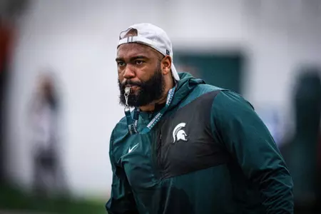 Winston DeLattiboudere III conducts a drill at spring practice in March 2026.