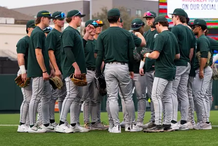 Team huddle at Texas