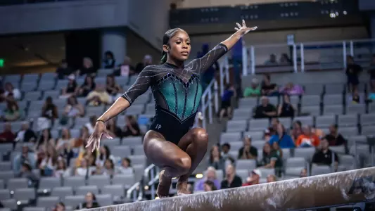 Nikki Smith competes on beam at the NCAA Championships