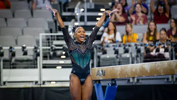 Nikki Smith celebrates after a beam routine at the NCAA Gymnastics Championships