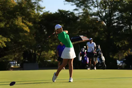 Lucia Valderrama swings.