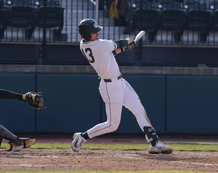 CJ Deckinga action swinging.