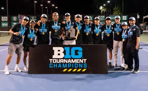 Michigan State men's tennis team is the 2025-26 Big Ten Tournament champion and poses with the championship trophy.