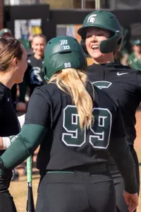 Britain Beshears celebrates a home run