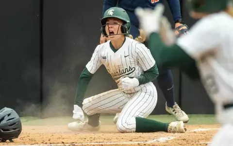 Ava Coffinger Celebrates Scoring a run