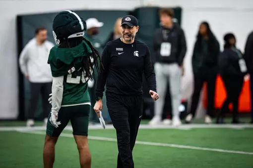 Joe Rossi walks the field during spring practice at Michigan State in March 2026.