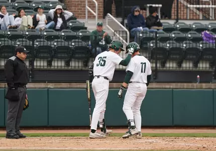 Randy Seymour and Parker Picot celebrate together at home plate after Picot's HR vs EMU on May 12, 2026.