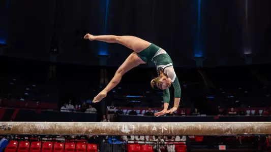 Cady Duplissis competes on beam at the Big Ten Gymnastics Championships