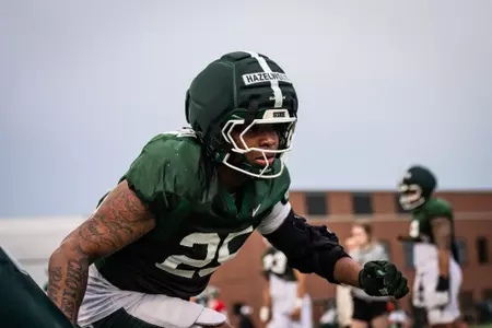 Carlos Hazelwood goes through a drill during spring practice.