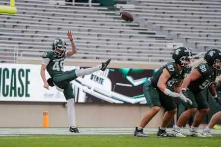Alex Weeks punts during the 2026 Spring Showcase in Spartan Stadium.