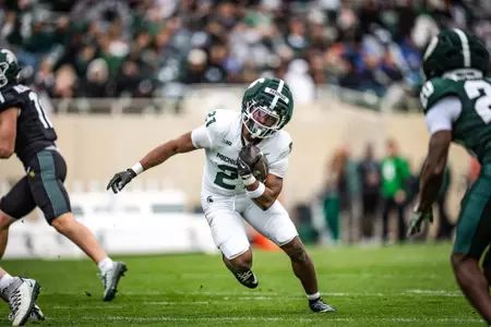Marvis Parrish runs through the line at the 2026 Spring Showcase in Spartan Stadium.