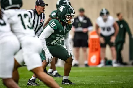 Dion Crawford lines up on defense at the 2026 Spring Showcase in Spartan Stadium.