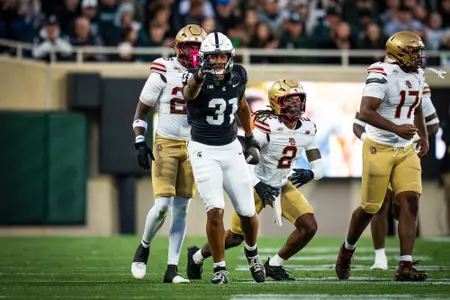 Jayden Savoury celebrates after catching a pass for a first down against Boston College in 2025.