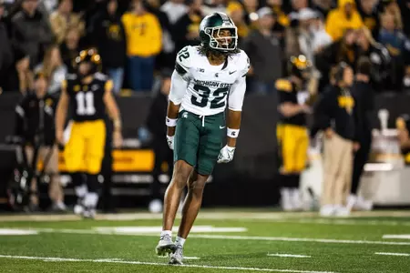 Evan Young celebrates during MSU's game at Iowa in 2025.