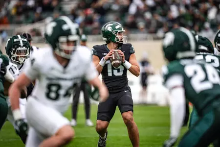 Leo Hannan drops back to pass at the 2026 Spring Showcase in Spartan Stadium.