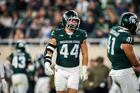 Jay Coyne smiles during a game against Penn State at Spartan Stadium in 2025.