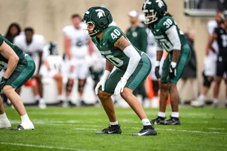 DeJae White lines up on defense at the 2026 Spring Showcase in Spartan Stadium.