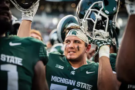 Chris Piwowarczyk celebrates after a Spartan victory during the 2025 season.