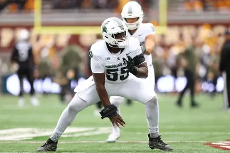 Rakeem Johnson goes through warm-ups at Minnesota in 2025.