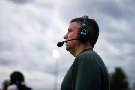 John McNulty coaches during spring practice for the Spartans.