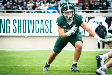 Cal Thrush lines up on defense at the 2026 Spring Showcase in Spartan Stadium.