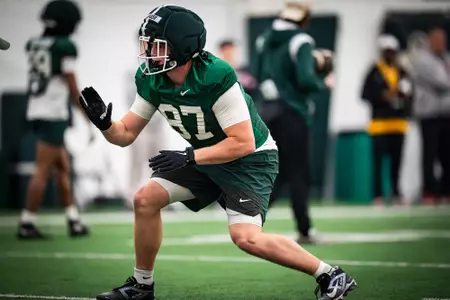 Luke DeJager goes through a drill at spring practice.