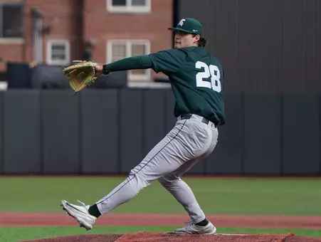 Aidan Donovana action in wind-up to deliver a pitch.