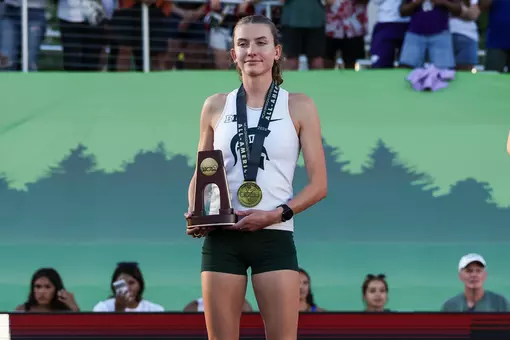 Kate Stewart-Barnett at the podium at the NCAA Championships