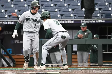 Ryan McKay and Isaac Sturgess celebrate at the B1G Tournament