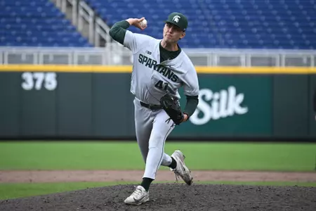 Nolan Higgins action photo vs USC at Charles Schwab Field at Omaha, Neb.