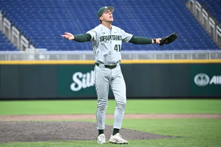 Nolan Higgins action photo vs Iowa at Charles Schwab Field at Omaha, Neb.