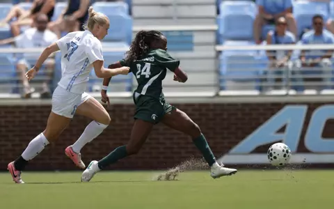 Kennedy Bell goes to goal for her first of two scores at North Carolina