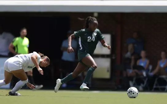Kennedy Bell gets past a UNC defender