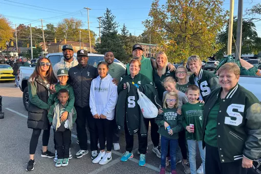 Homecoming Parade photo with Spartan fans