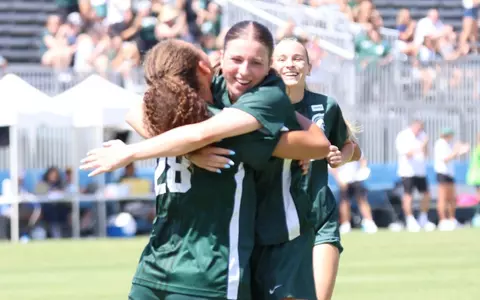 Kayla Briggs and Renee Watson Celebrate a Goal at UCLA