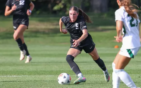 Kayla Briggs dribbles through the midfield