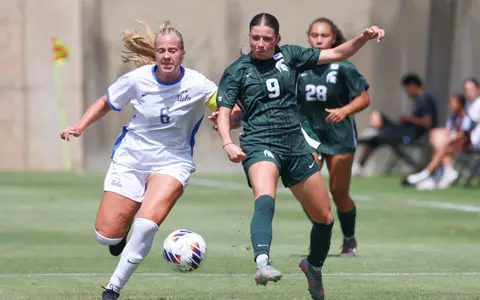 Kayla Briggs fights for a ball vs. UCLA