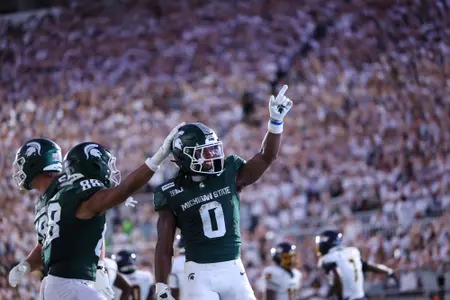Cam Edwards celebrates following a touchdown in the season opener vs. Toledo.