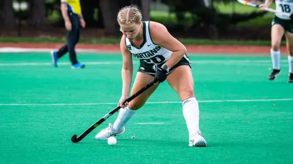 Ellie Kendall hits the ball at Ralph Young Field