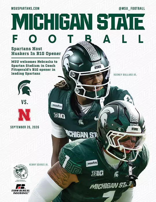 2026 Football Game Program cover vs Nebraska with football players Rodney Bullard Jr. and Kenny Soares Jr., and also logos of teams and sponsors.
