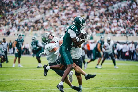 Fredrick Moore catches a touchdown pass against Eastern Michigan on Sept. 12, 2026.