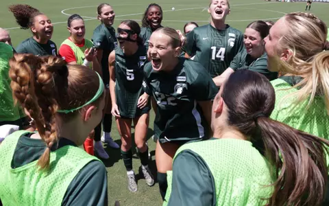 Ella Janz Hypes her teammates in advance of a game at North Carolina