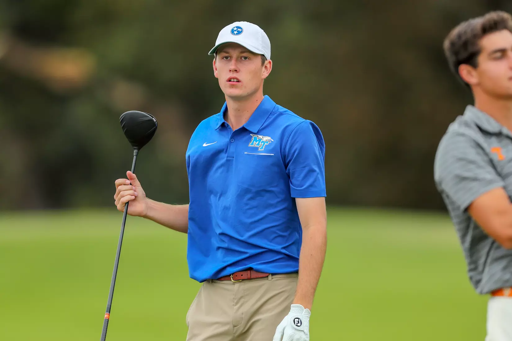 golfer standing with club