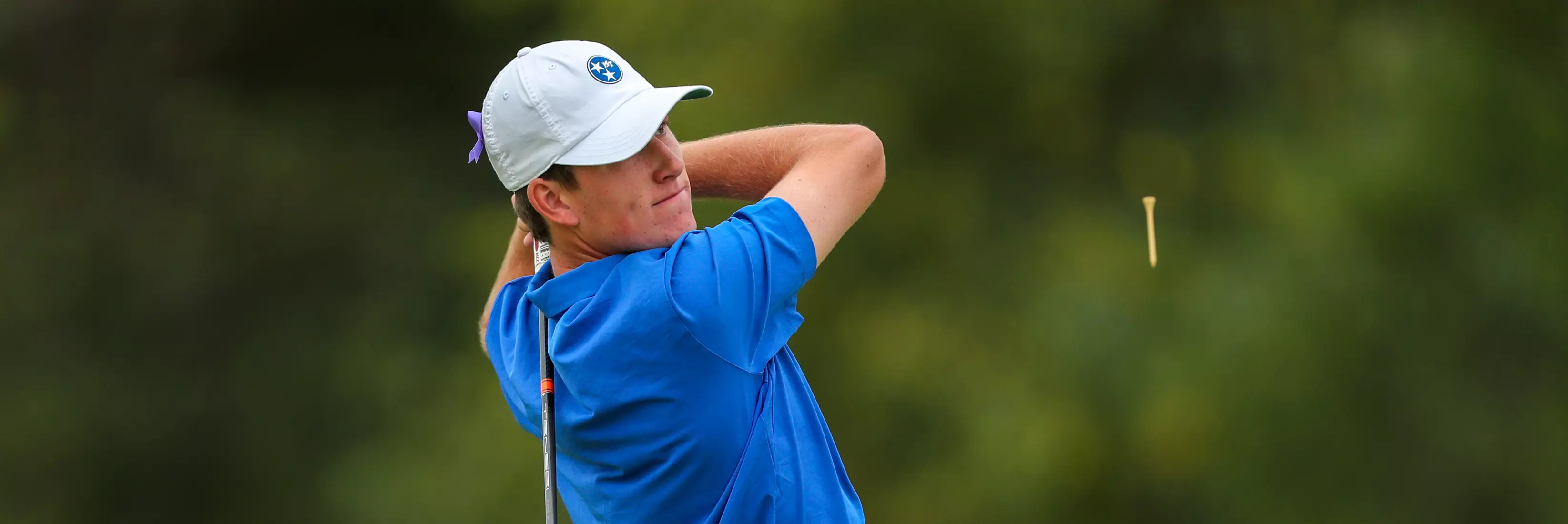 golfer standing with club