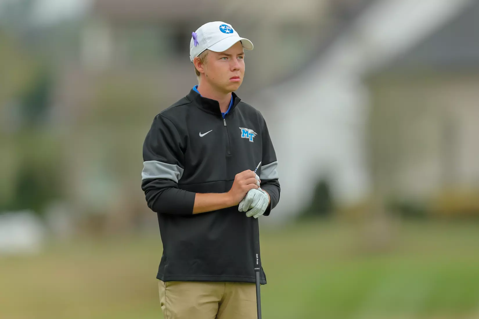 golfer standing with club
