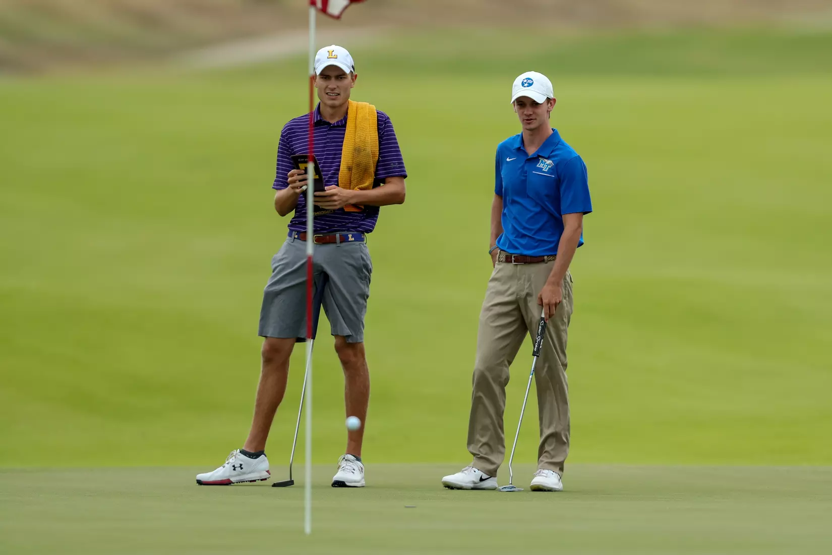 golfer standing with club